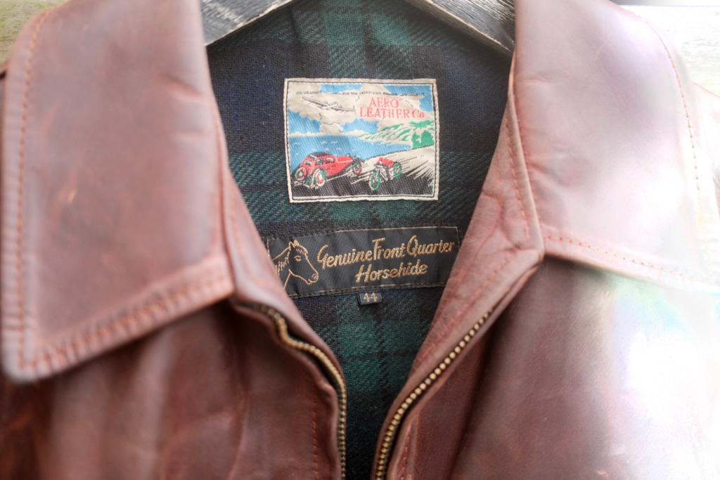 Curated Second hand jacket detail – open brown aero leather jacket